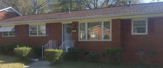 The same ranch home after an exterior repaint