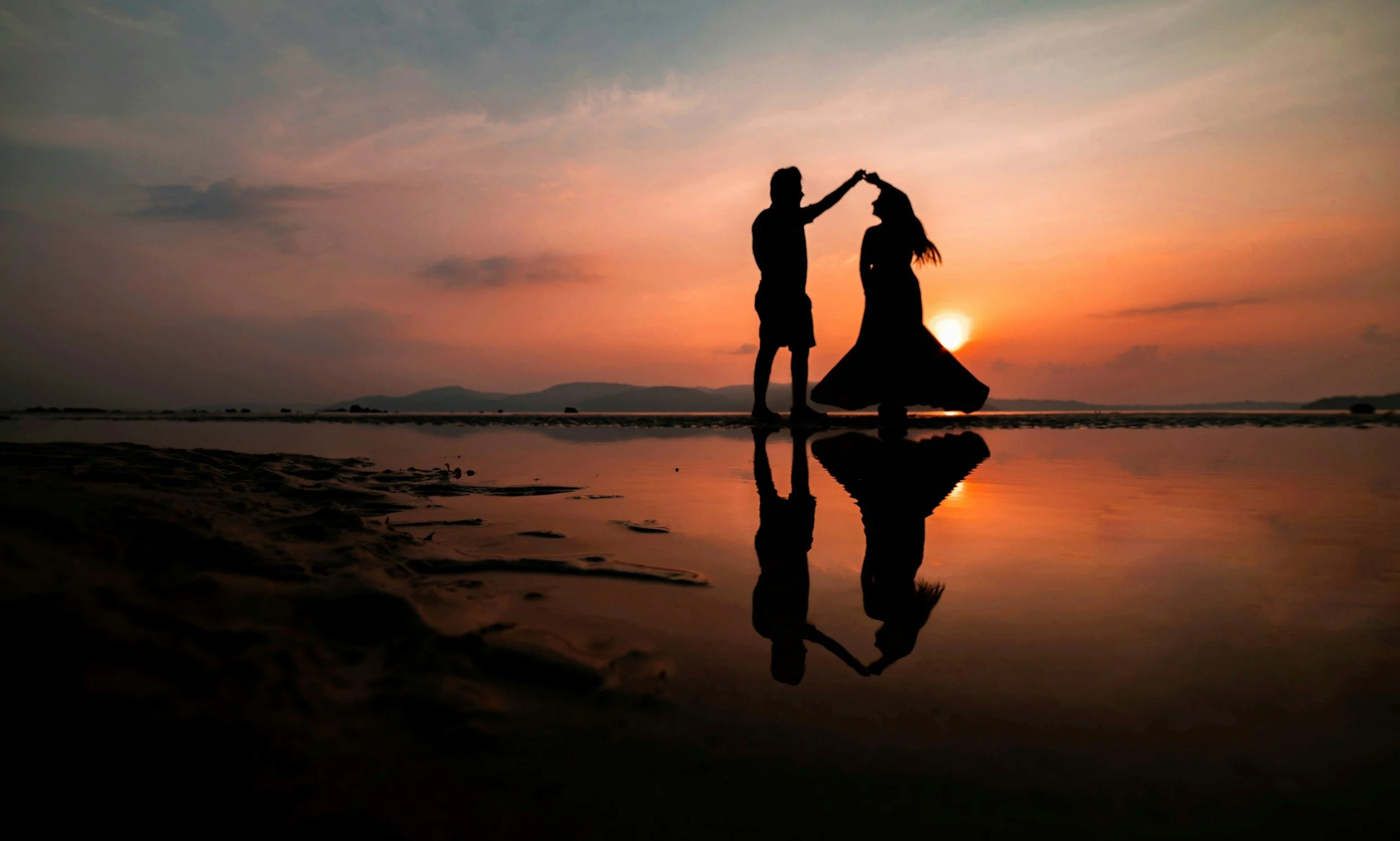 Couple reconnecting together at sunset